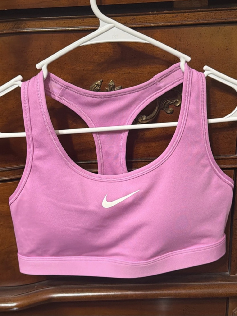 Nike Light Pink Racerback Sports Bra with White Swoosh